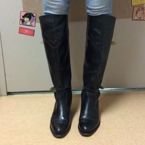 Knee high black leather boots
