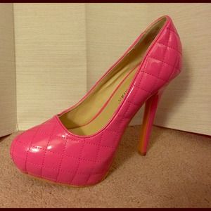 Hot Barbie pink patent pumps.