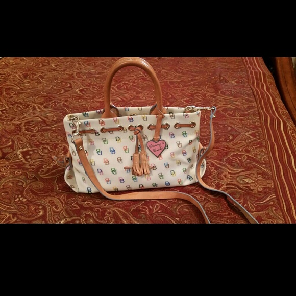 Dooney & Bourke Handbags - Dooney & Bourke white leather signature purse
