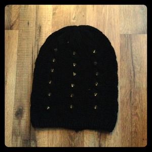Black knit beanie with gold spiked studs