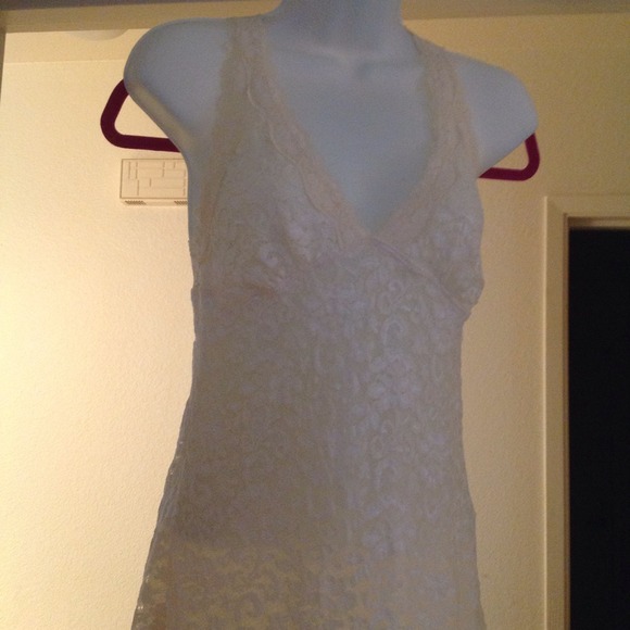 Creme lace blouse, fully lined.