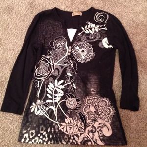 Black shirt with flyers and sparkles