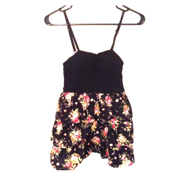 Baby doll floral blouse with fitted black top.