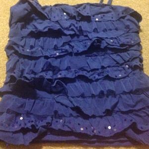 Justice tank top with ruffles and sequence .