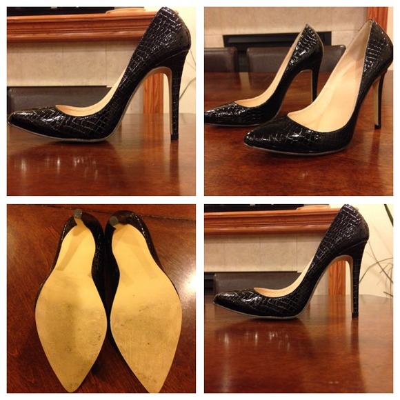 Black crocodile pumps