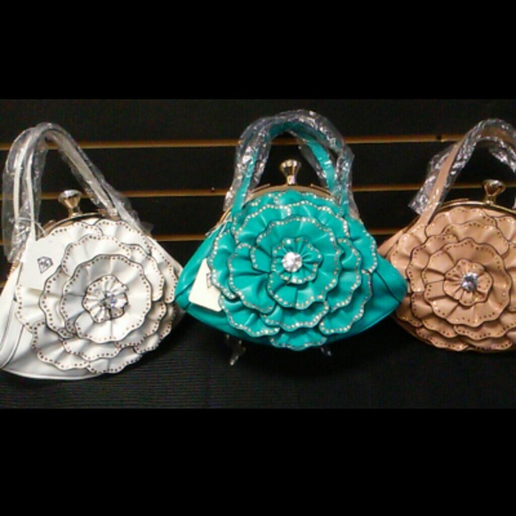 A set of 3 Luxury Handbags
