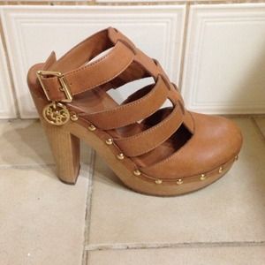 Tan leather gold studded wooden platforms