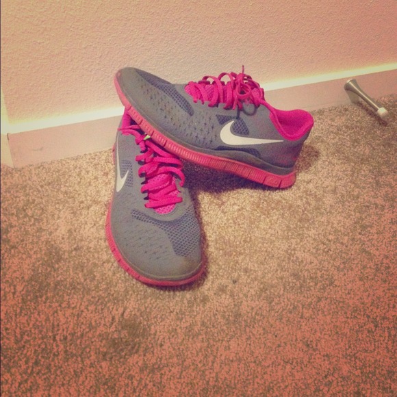 Pink and grey Nike frees