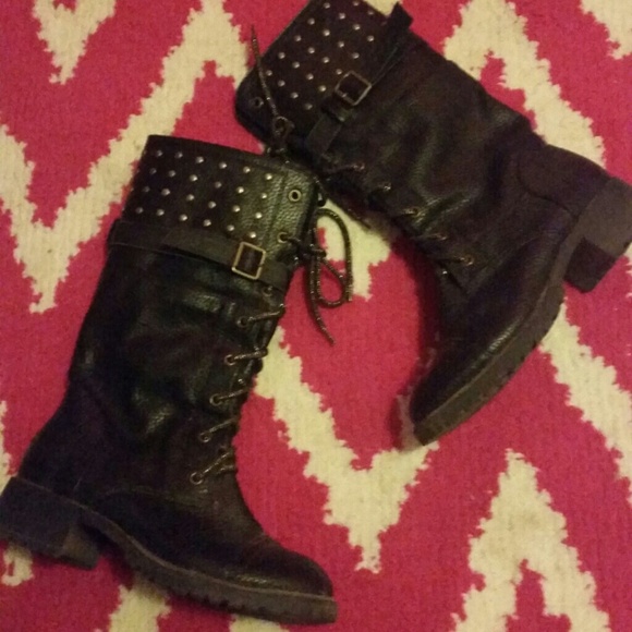 Black leather boots with copper hardware