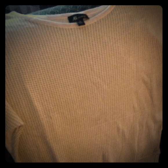 White and gold sweater
