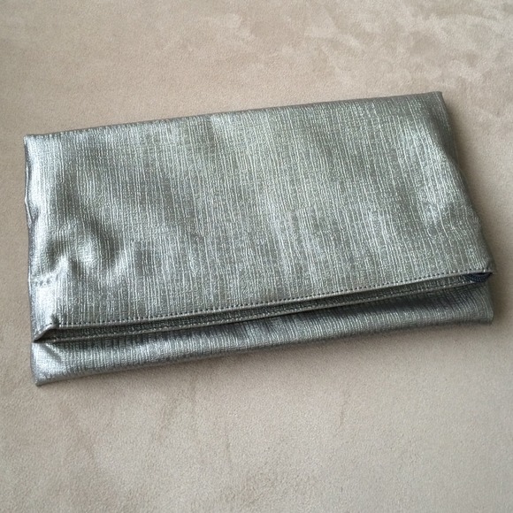 Silver spacious soft clutch