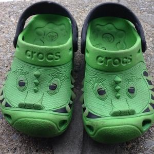 Green alligator crocs. Size 6-7. Used