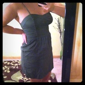 Really cute olive green sundress. It's a medium.
