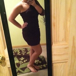 Burgundy one lace sleeved cocktail dress.