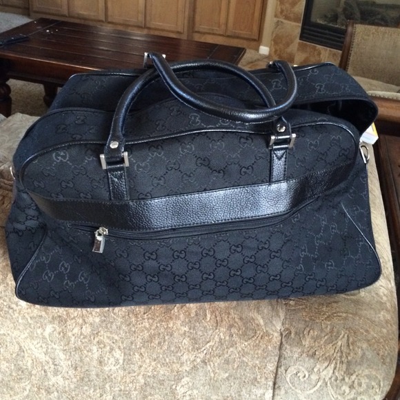 💯Authentic black Gucci  denim carry on.