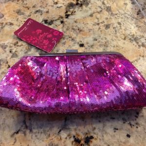 Lulu Townsend purple clutch purse. Has tags some