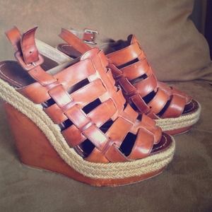 Christian Louboutin brown wedges.