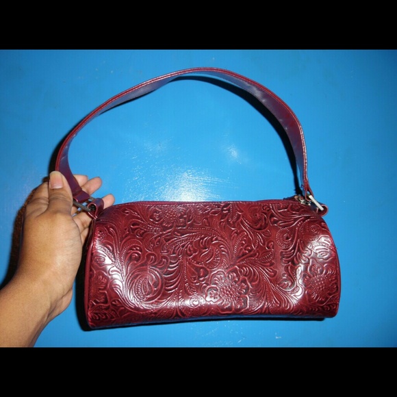 Red purse with beautiful intricate pattern