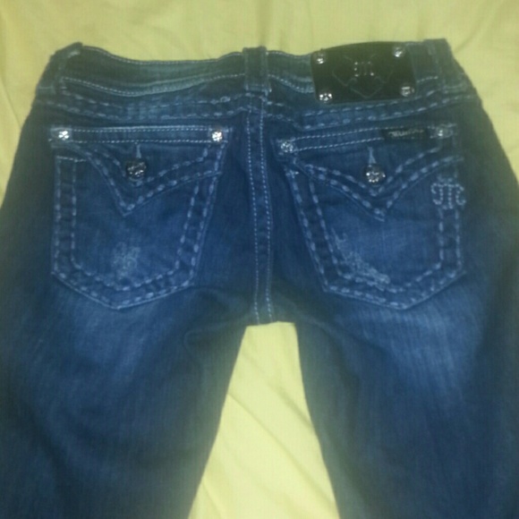 Reduced!!!!  Dark sz25 distressed miss me's
