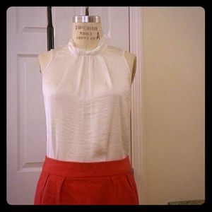 Hi- neck sleeveless blouse