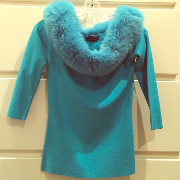 Teal top with off the shoulder faux fur.
