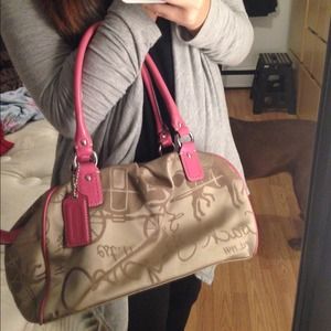 Small tan and pink coach purse