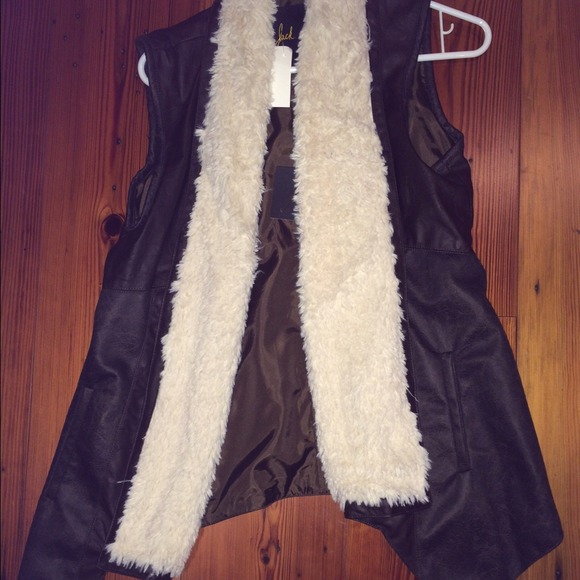 Dark brown leather vest with fur