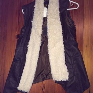 Dark brown leather vest with fur