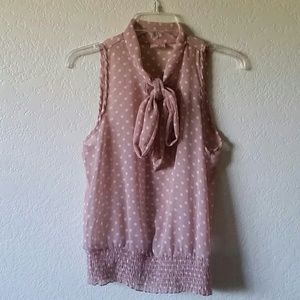 Pink and white polka dot blouse