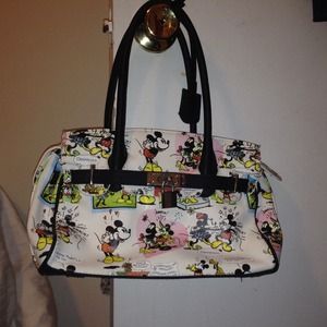 A purse with Mickey Mouse logos