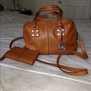 Michael Kors leather handbag and matching wallet.