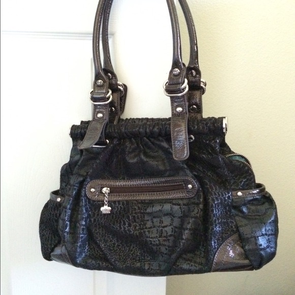 Medium sized black purse by Kathy. - Picture 1 of 3