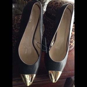 Black with gold toe pumps