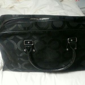 Not a coach bag! But a look alike. Overinght bag