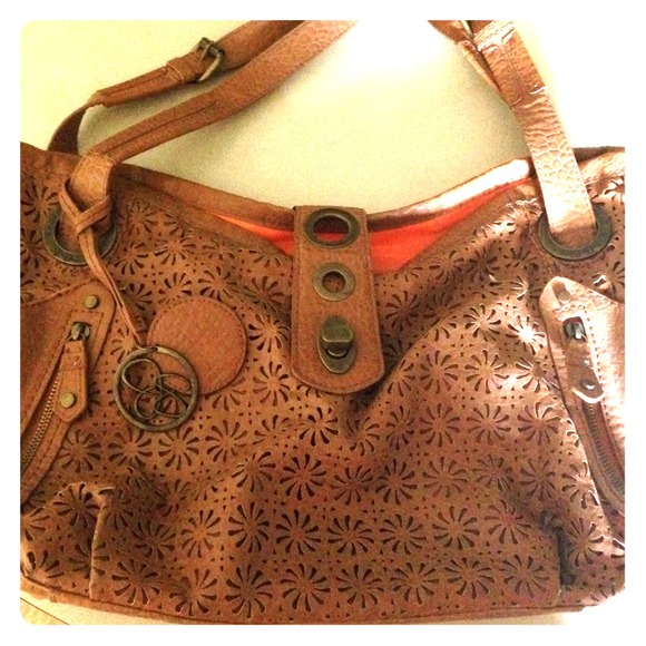 Tan handbag with orange lining