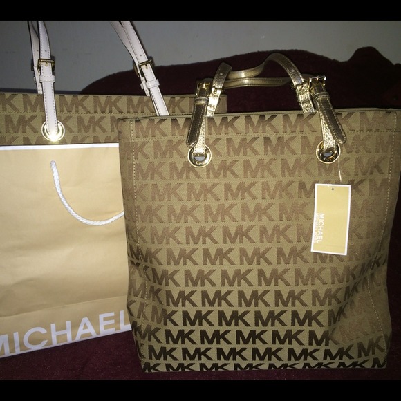 Michael Kors Handbags - Authentic Michael kors purse....gold and orange..