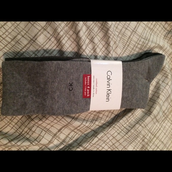 Knee high Calvin Klein socks.