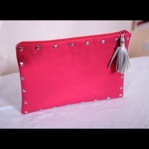Pink studded /tassel clutch