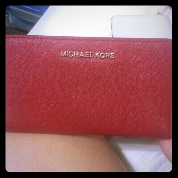 SOLD!Michael kors saffiano intr stripe snap wallet