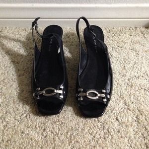 Black raised heel sandals