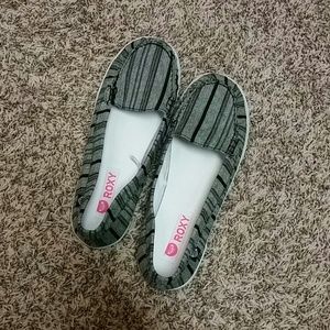Roxy black and white boat shoes.