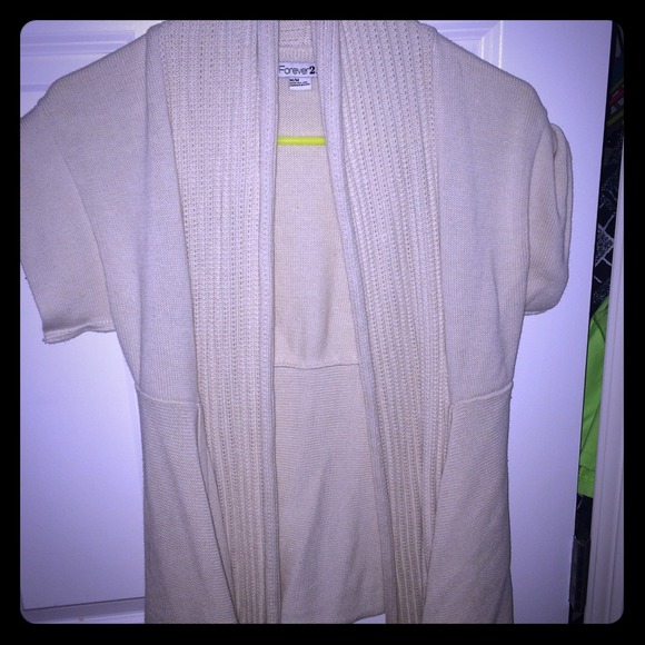 Sleeveless cardigan.