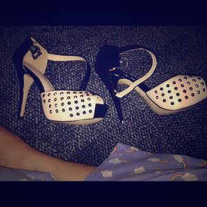 Nude and black pumps, never worn and adorable.