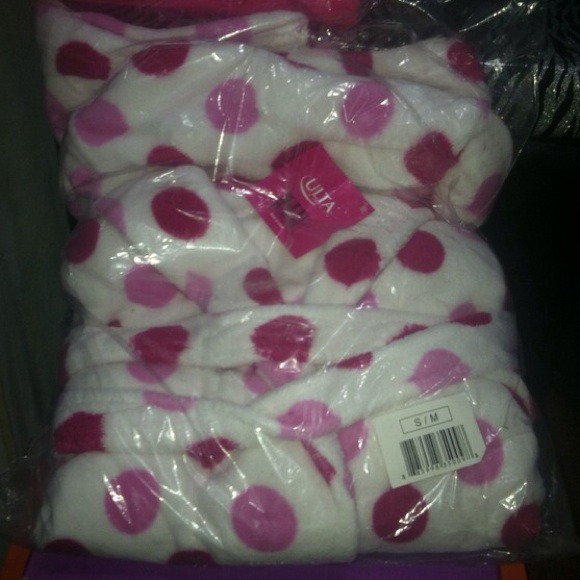 Ulta white robe with pink polka dots.