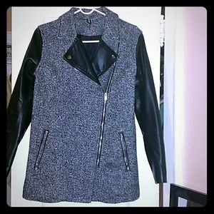 Coat with faux leather sleeves