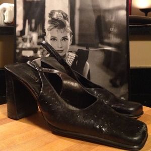 Black leather Charles David sling backs.