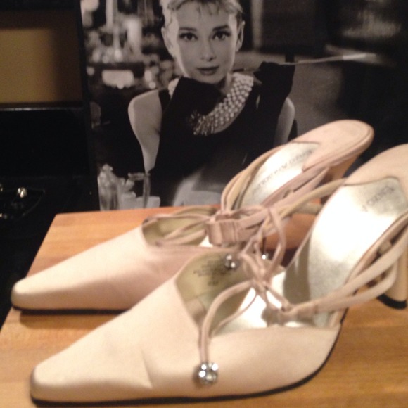 Satin gold mules.