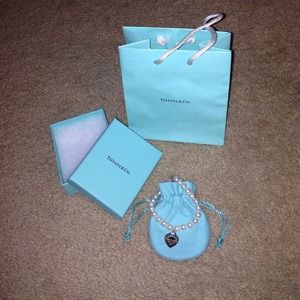 Authentic tiffany pearl and heart bracelet.