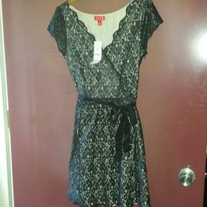 Black lace dress, underlay is beige