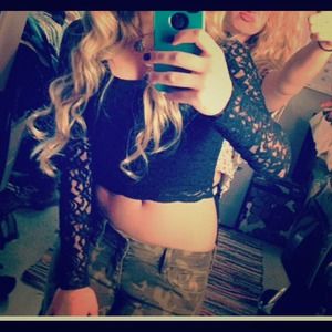 Black lace cropped long sleeve top